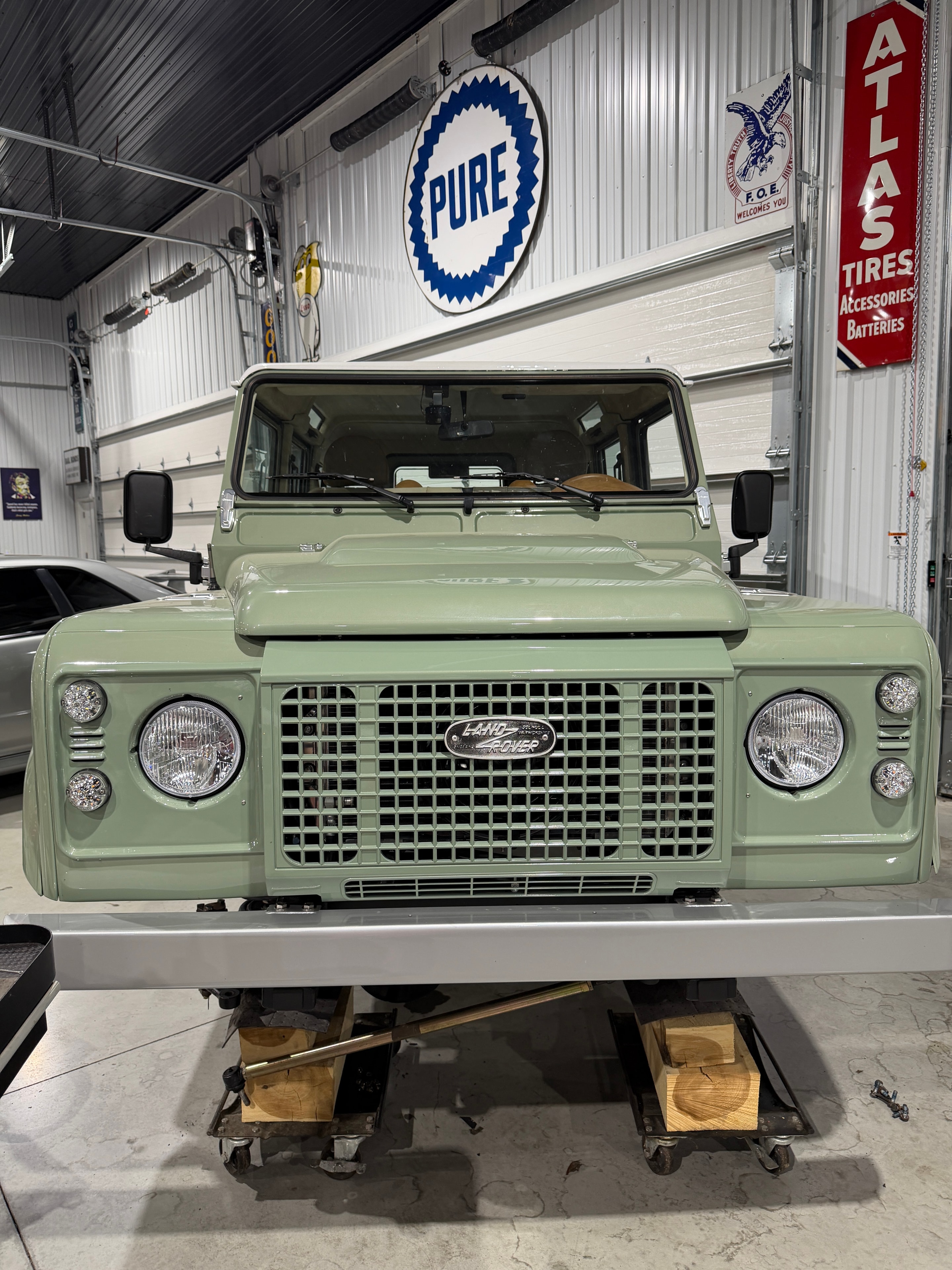 1987 Land Rover Defender 110 — custom two-tone tan and cognac leather interior