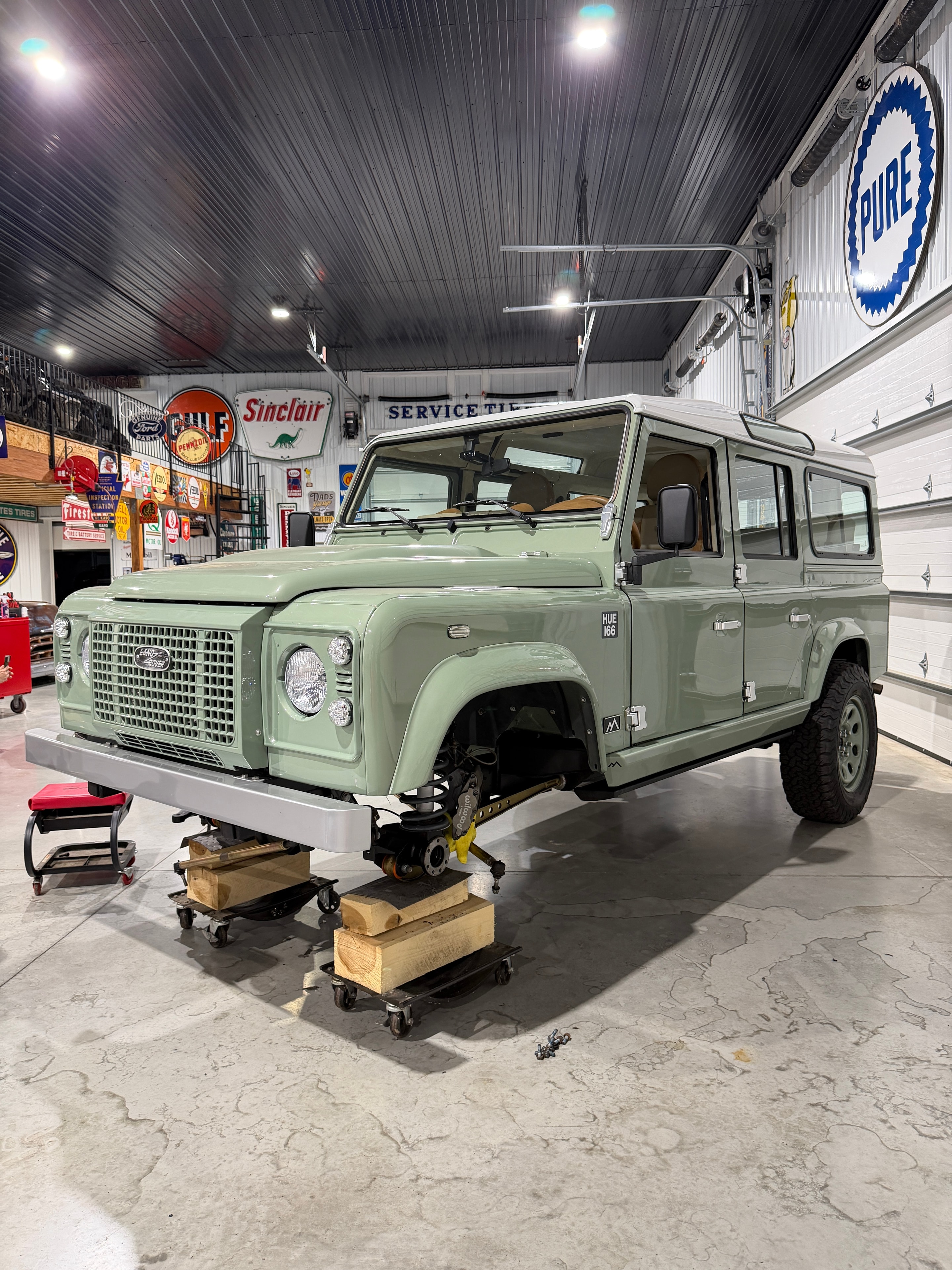 1987 Land Rover Defender 110 — Momo leather steering wheel and green dash