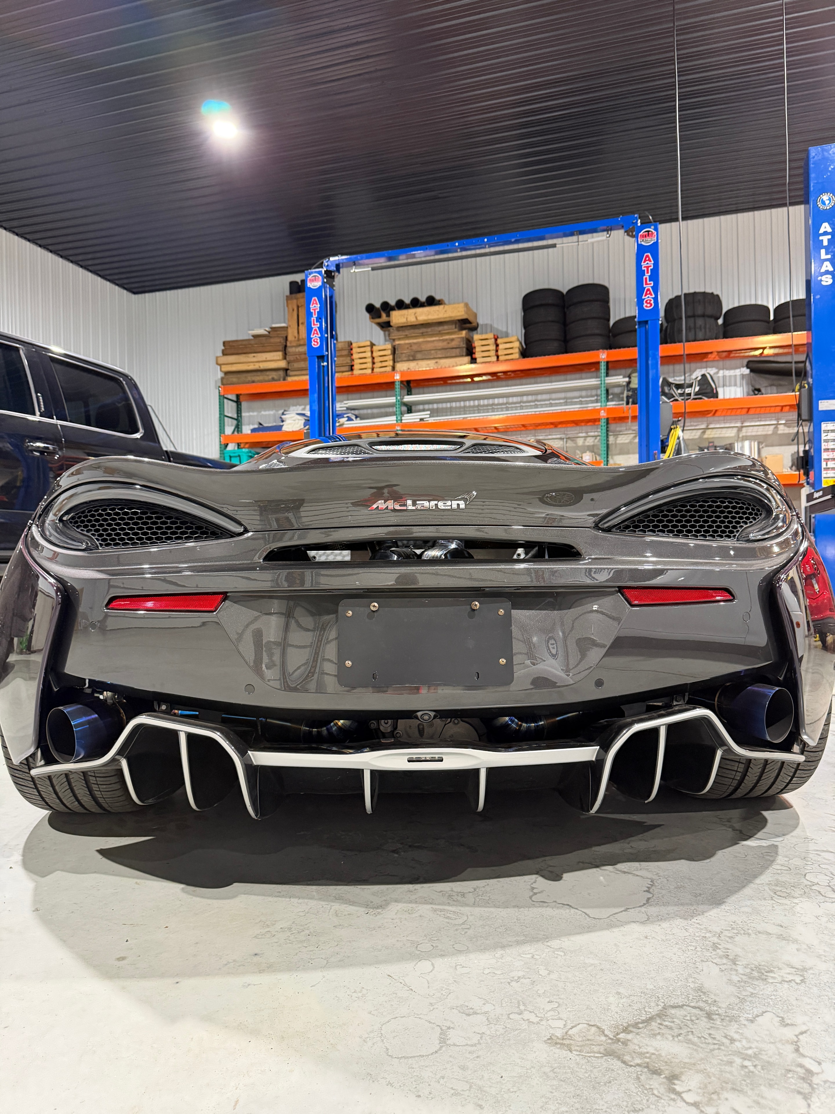 2018 McLaren 570GT Lantana Purple — engine bay detail 7