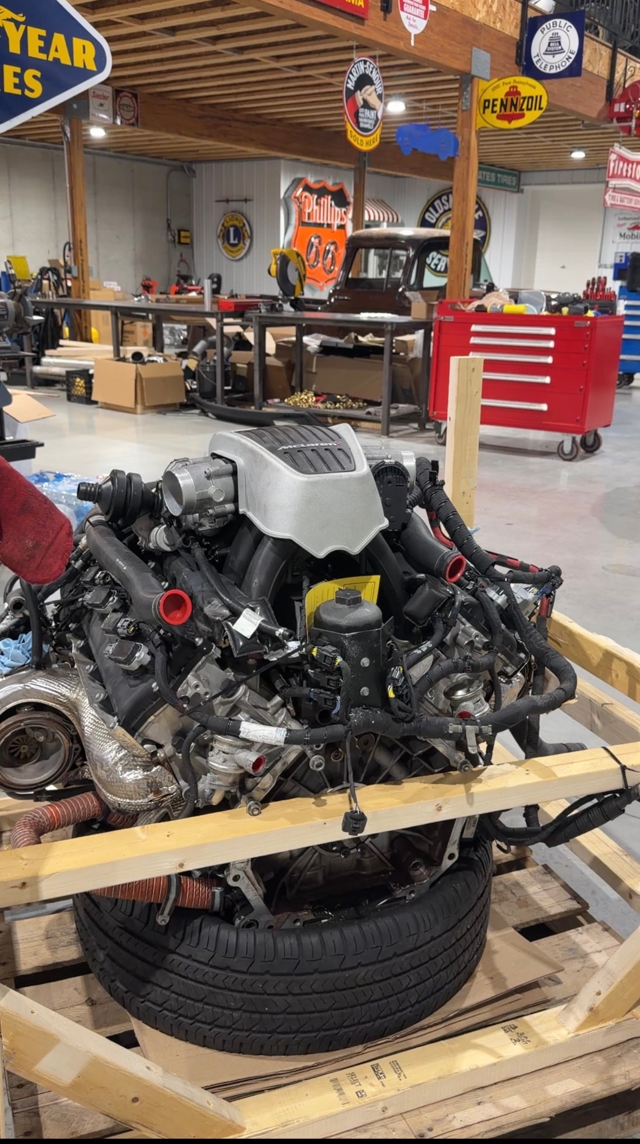 2018 McLaren 570GT — new M838TE replacement engine arriving on pallet, McLaren badge visible