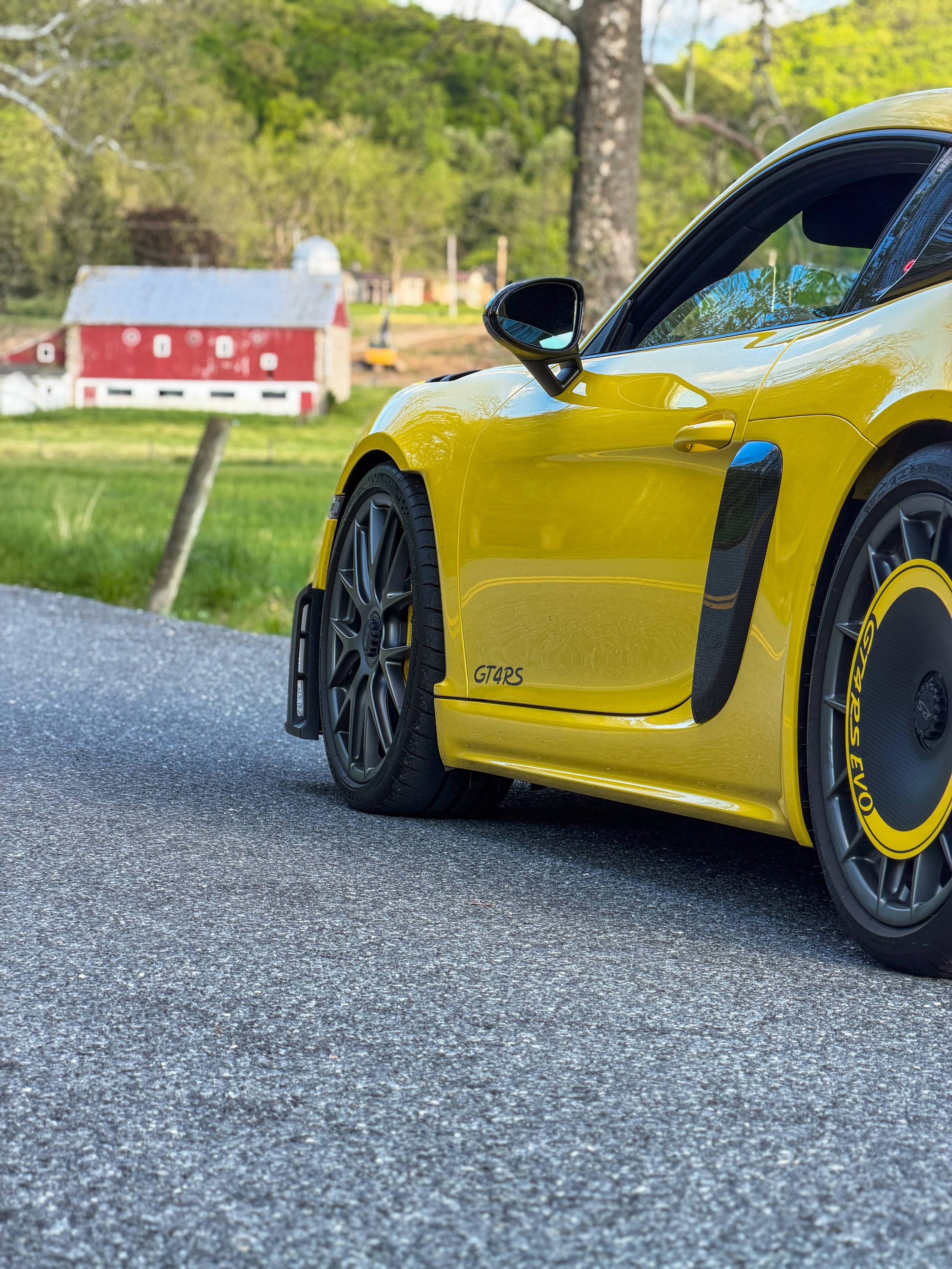 2024 Porsche GT4RS — side profile with carbon fiber intakes